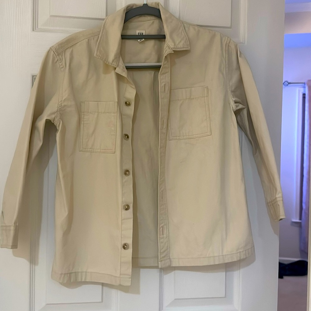 Tan shirt